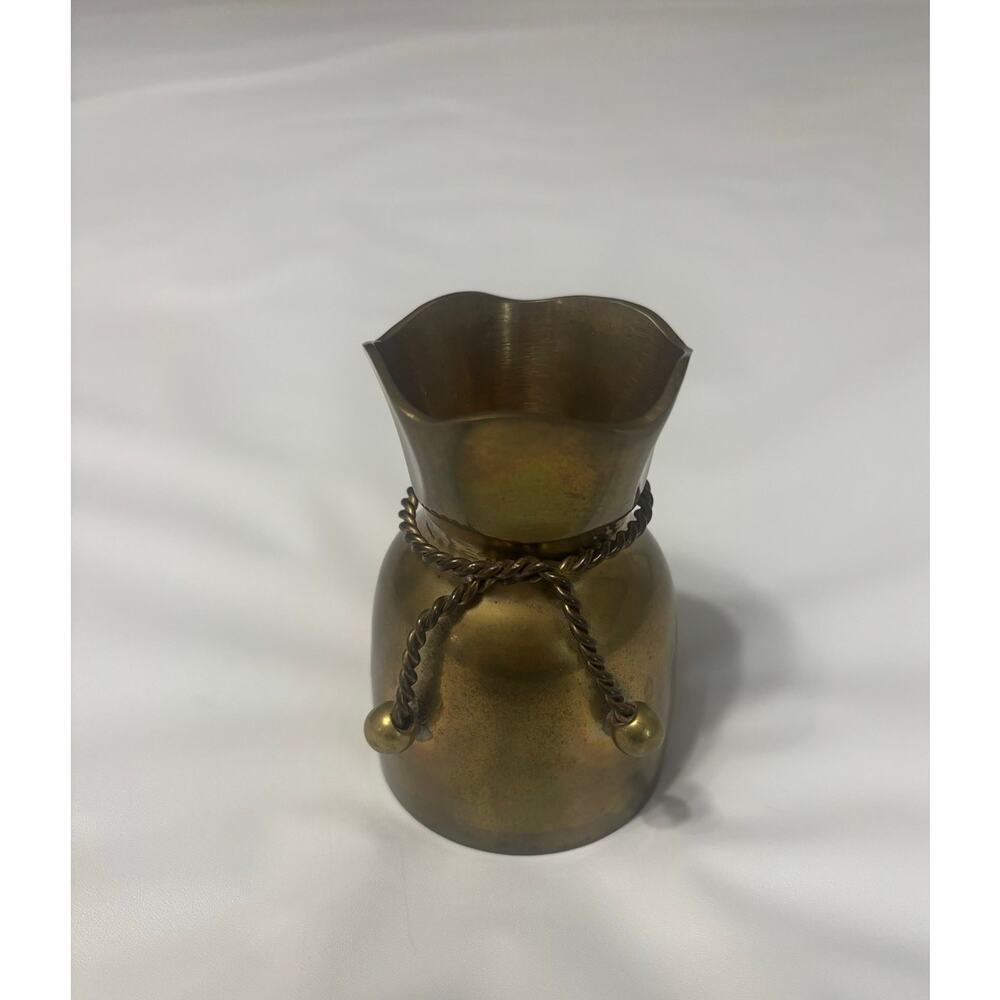 Small brass decorative vase with attached braided rope design